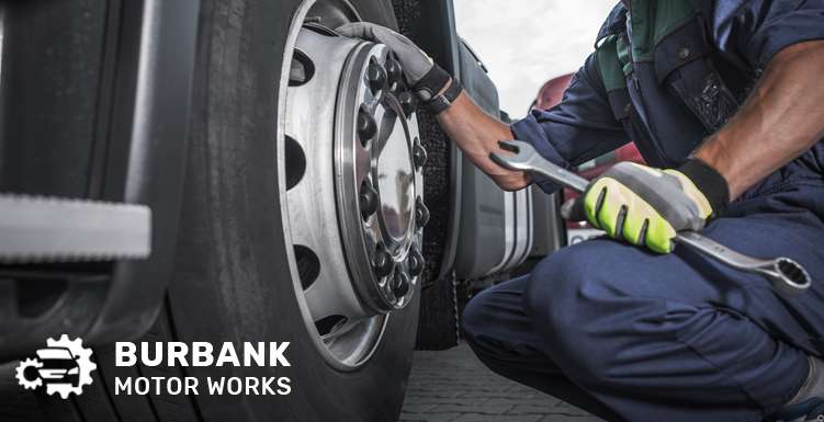 Mechanic inspecting a vehicle’s bad brake system